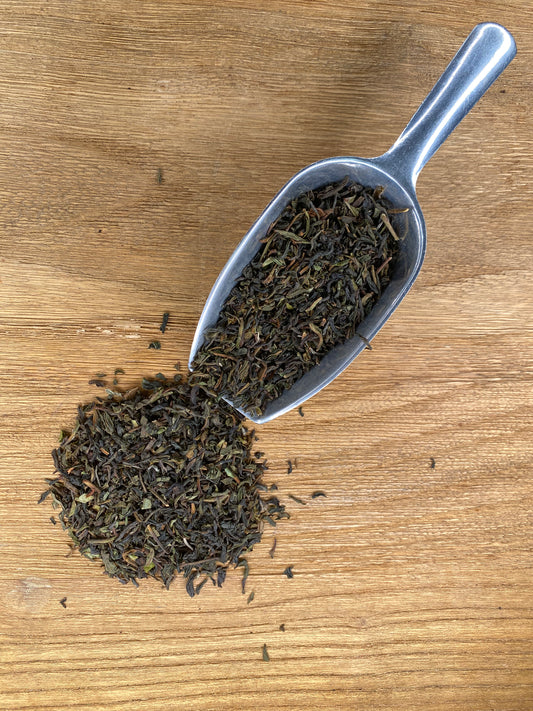 Pelle à thé noir darjeeling